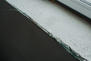 Surface texture of a concrete windowsill during a cloudy afternoon