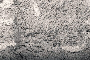 Textured concrete surface revealing intricate patterns and details