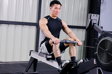 Fototapeta premium Asian men exercising in the gym, health exercise concept.