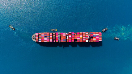 Aerial top view shipping cargo to harbor.