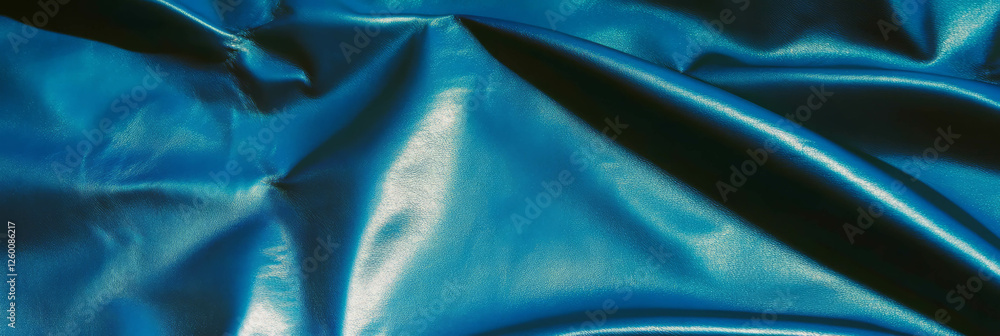 Poster blue leather with fine grain and visible texture highlighted by side lighting