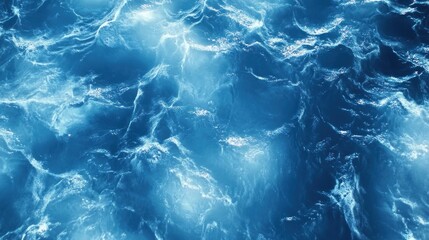 Obraz premium Serene Blue Ocean Waves with Sunlight Reflection