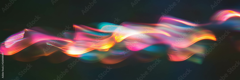 Poster Swirling bokeh texture with vibrant color transitions and flowing light patterns