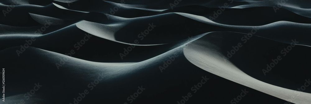 Aufkleber Black sand dune displaying intricate wind patterns and shadows across varied slopes