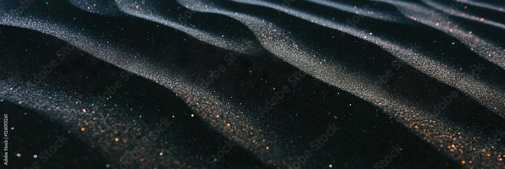 Poster texture of black sand with windblown patterns under soft lighting creates serene ambiance
