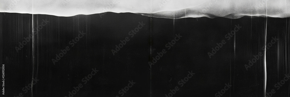 Poster exploring the depth of a grunge textured black wall with shadows