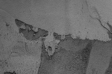 Texture of gray concrete wall with artistic, rough design details