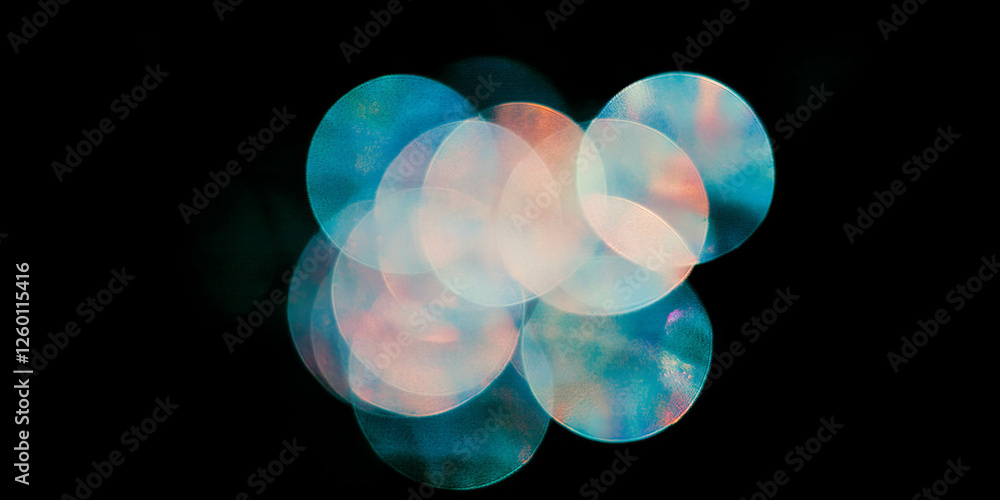 Aufkleber bright circular bokeh texture, featuring intense sparkle and blue tint against black background