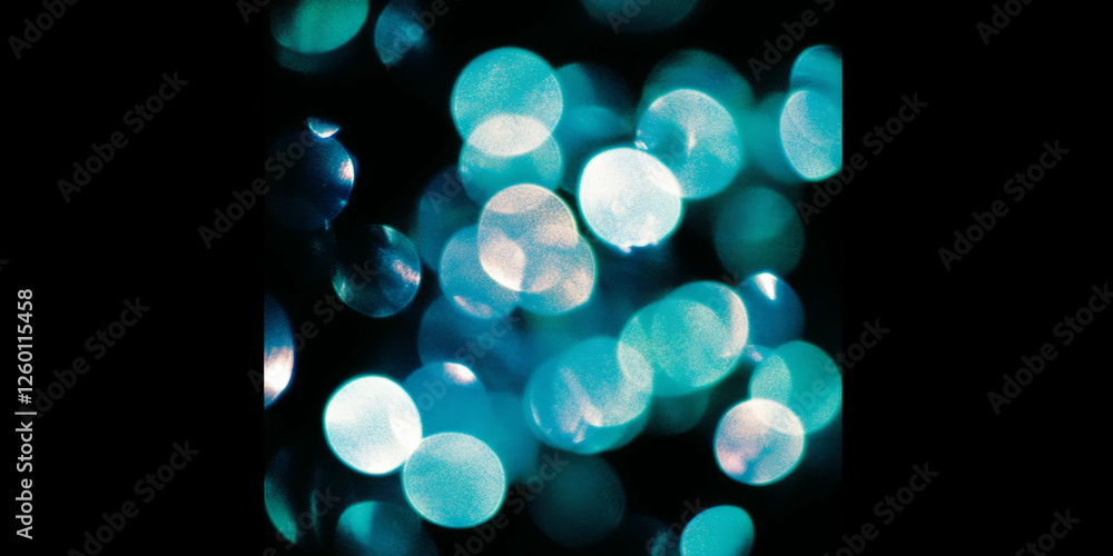 Poster Bright circular bokeh texture with cool blue tint on black background enhancing visual depth