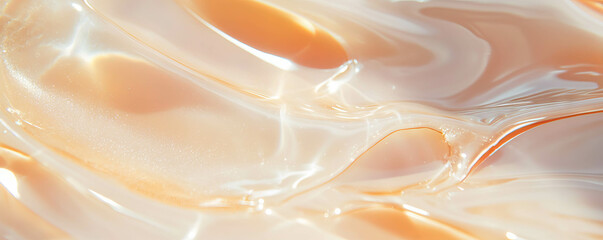 Clear gel texture on beige background with subtle ripples and sheen for cosmetic use
