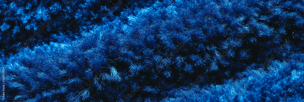 Aufkleber indigo carpet texture showcasing varied loop sizes and dense pile in even lighting