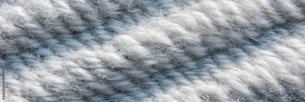 Poster texture of light gray dense berber carpet with looped pile and subtle surface detail