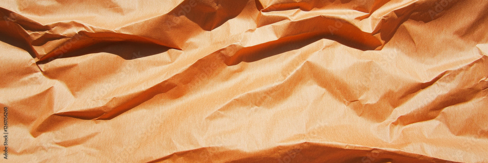 Poster texture of medium brown paper showcasing subtle wavy grain and smooth surfaces for artistic use