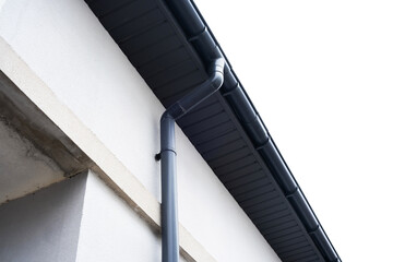 Naklejka premium Gutter and downspout system visible on a modern building exterior