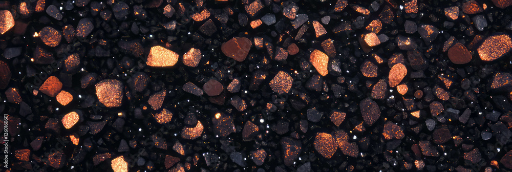 Poster Mottled brown and black surface with fine texture and evenly distributed particles