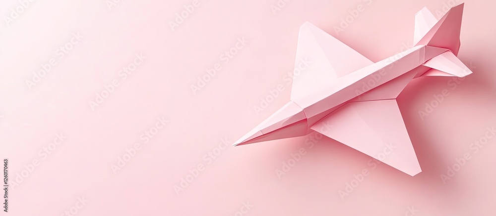 Poster pink origami paper plane positioned on the right side of a soft pink background creating a minimalis