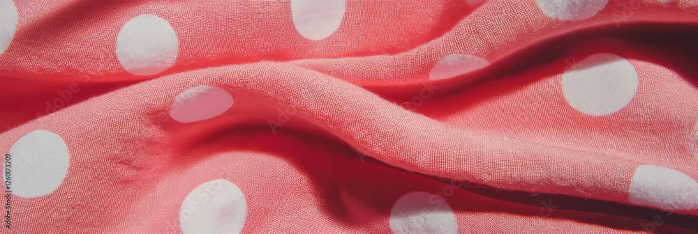 Poster soft pink cotton tablecloth with playful polka dot pattern and gentle texture