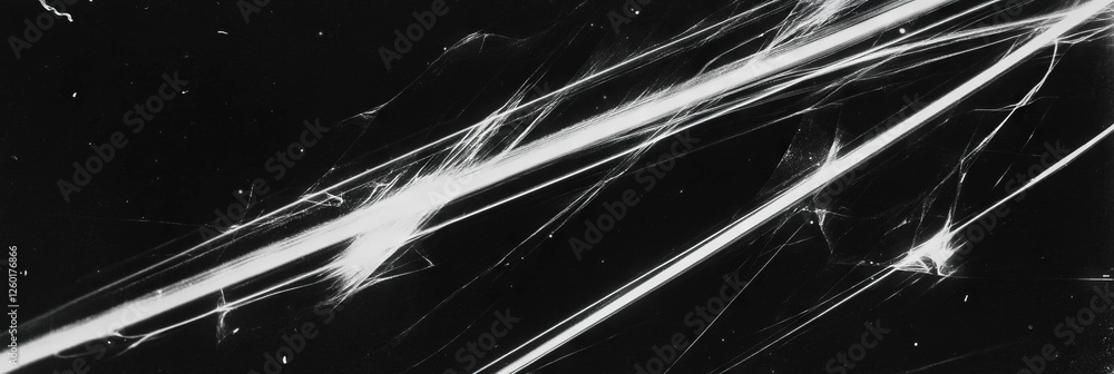 Poster texture of scanned film displaying deep crosshatch scratches and bright highlights