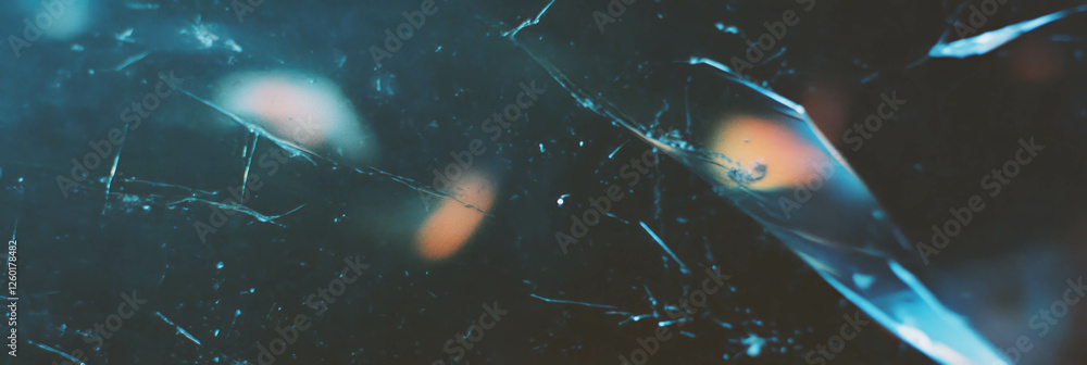 Aufkleber textured surface of scratched film displaying jagged lines and dark shadows