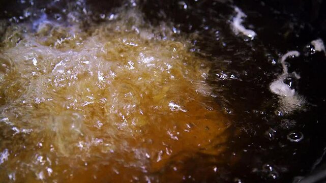 Deep frying food in hot oil