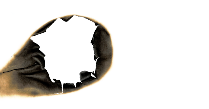 burned hole white paper background texture. Burn in paper with brown edges and flames isolated on transparent background