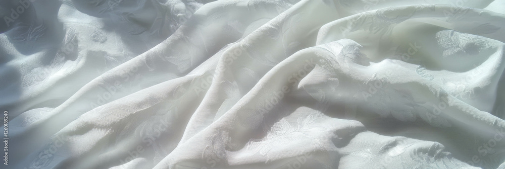 Poster elegant white brocade tablecloth featuring intricate raised floral patterns in a soft texture