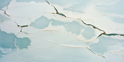 Texture of a white wall featuring fine cracks and light grey lines