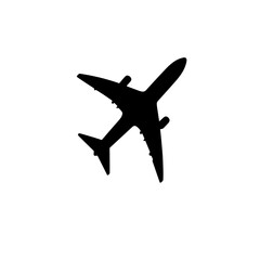 Black silhouette of an airplane in flight.
