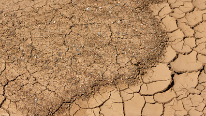 dried soil. drought-cracked lake floor photos