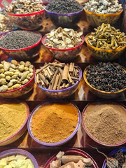 Large choice of colorful spices in the traditional arabian market in Dubai
