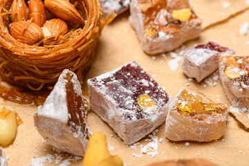 Sweet food Turkish delight on wooden background, assorted locum and candy for decorated backdrop