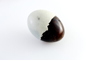 Century Egg with Partially Removed Shell