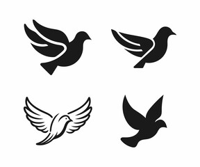 Four Simple Black and White Pigeon Silhouettes in Flight