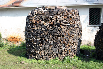 A Stack of birch firewood closeup