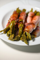 Deliciously wrapped asparagus with savory bacon on a stylish plate
