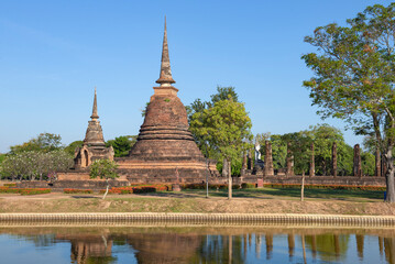 View of the chedi (stupa) of the ancient Buddhist temple Wat Sa Si on a sunny day. Sukhothai...