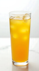 A modern glass filled with iced turmeric drink, showcasing vibrant yellow hues and condensation enhancing its refreshing appeal