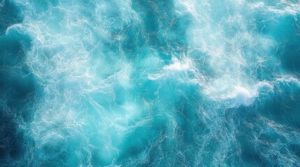 Obraz premium Ocean waves crashing with white foam and turquoise water, creating dynamic motion in the sea