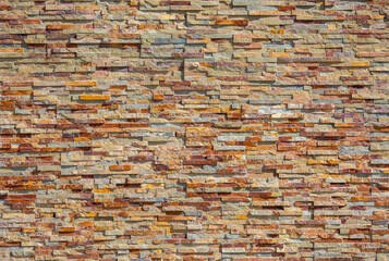 Vieux mur d'une maison en pierre pour vos arrières plans ou de la tapisserie.