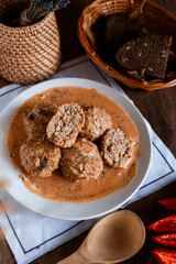 meatballs in tomato sauce, Ukrainian cuisine, rustic style, cutlets with sauce, cozy light still life, lunch, home cooking