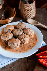 meatballs in tomato sauce, Ukrainian cuisine, rustic style, cutlets with sauce, cozy light still life, lunch, home cooking