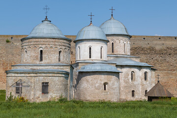 Two ancient churches of the Ivangorod Fortress close-up on a sunny July day. Leningrad Region, Russia