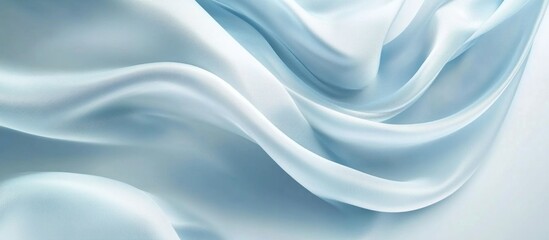 Fototapeta premium Elegant silky blue fabric with soft waves and subtle lines creating a luxurious background ideal for fashion and design projects.