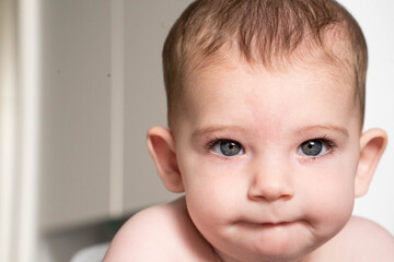 Baby portrait with funny expression