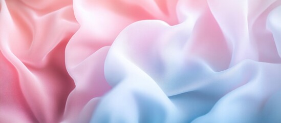 Obraz premium Soft pastel fabric texture with delicate color blur transitions creating an elegant background for various design applications.