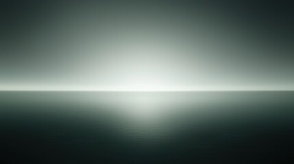 Obraz premium Black and white photograph of a vast body of water. the water appears to be calm and still, with a slight wave-like pattern on the surface.