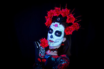 Woman dressed as Mexican Catrina