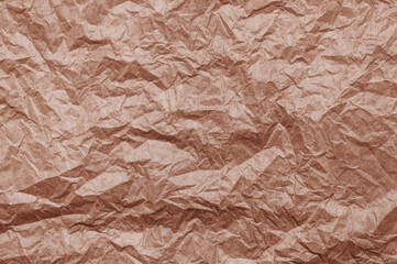 Elegant mocha mousse background on crumpled kraft paper texture. Mocha mousse grunge texture background.