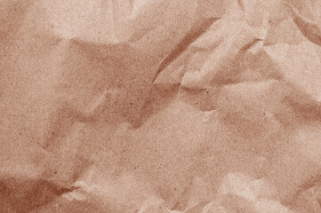 Elegant mocha mousse background on crumpled kraft paper texture. Mocha mousse grunge texture...