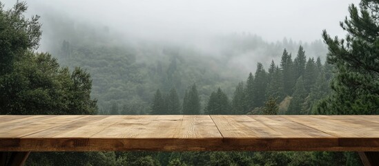Fototapeta premium Scenic wooden table with a forest backdrop creating a tranquil atmosphere perfect for text overlay and nature-themed designs